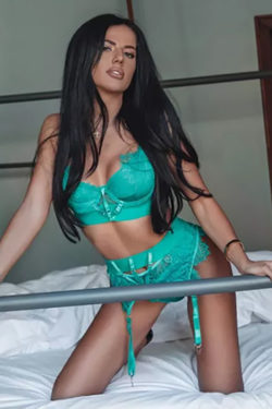 Outstanding young escort lady Regina from Italy offers lesbian service with sex date in Berlin