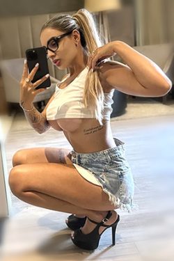 Blonde escort model Yonna from Berlin offers kinky and VIP sex